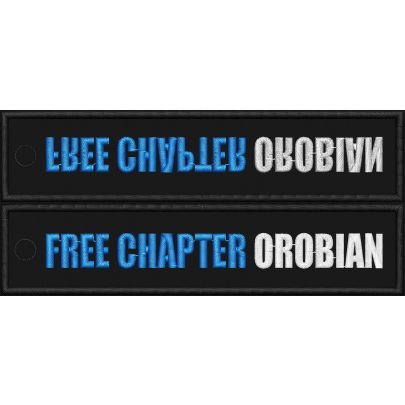 Ambientazione su carta  scritta FREE CHAPTER OROBIAN ad uso portachiavi