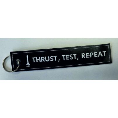 Patch ricamato "TRUST, TEST, REPEAT" lato primo