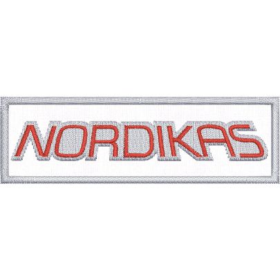 Patch ricamato su base bianca  cm.8 x 2,5 scritta "NORDIKAS"