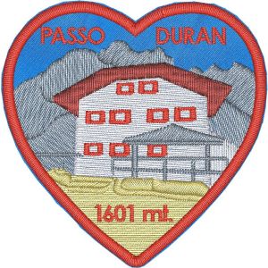 Patch ricamato a cuore su base azzurra PASSO DURAN 1601 mt. dimensione misure 65 mm.