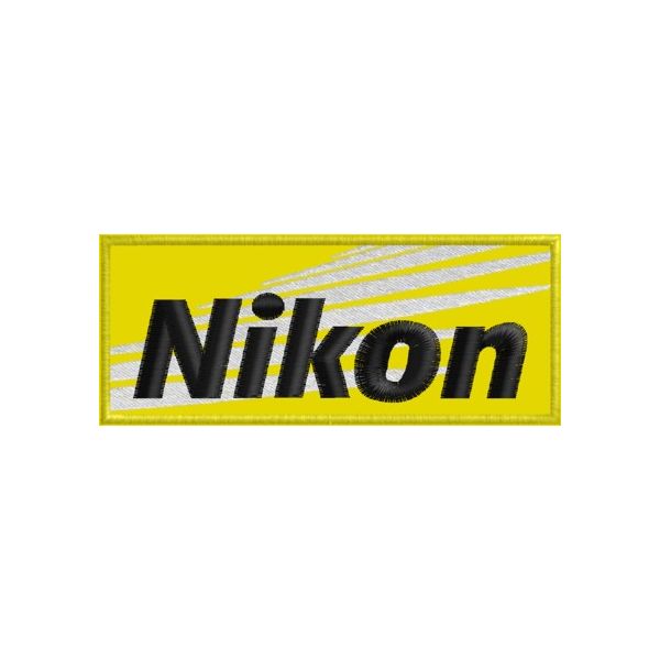 Patch ricamato Nikon Cod. 20130528_B  - Mis. 11x4,5 Cm.