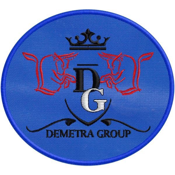 Etichetta ovale su fondo blu ricamata (DEMETRA GROUP) Cod.20150533_Co_BLU