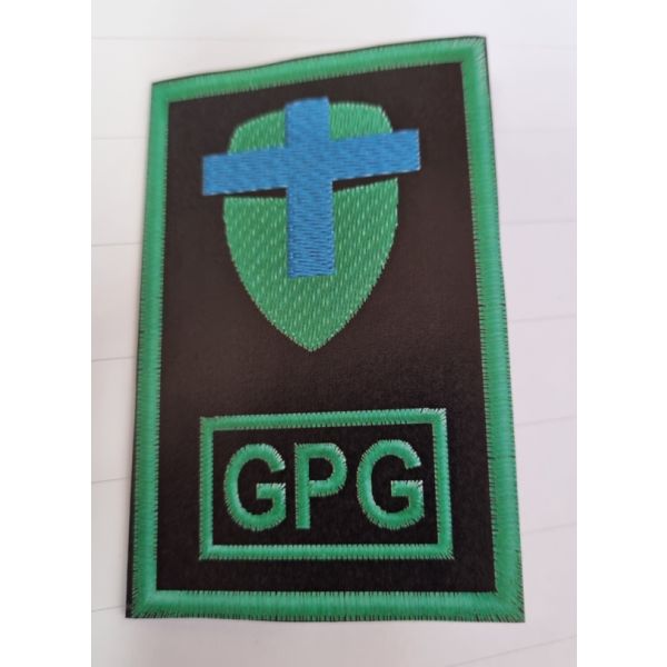 Tubolare ricamato "GPG" Scudo verde confezionato finito con dimens. 90 X 60 mm.