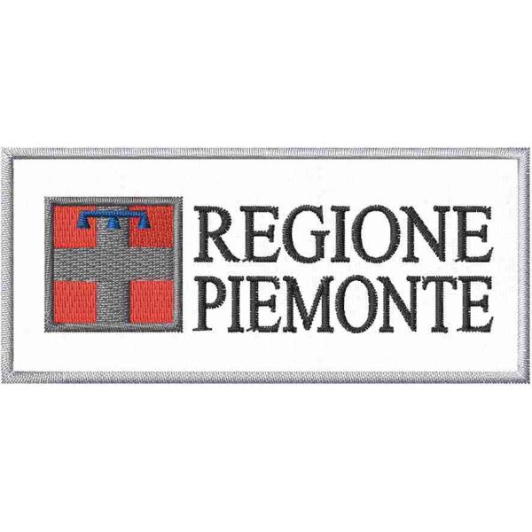 Patch ricamata con logo REGIONE PIEMONTE cm.9 X 4  