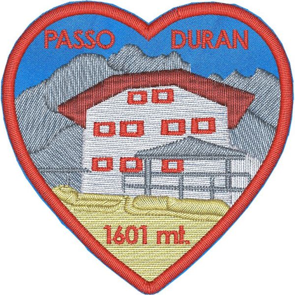 Patch ricamato a cuore su base azzurra PASSO DURAN 1601 mt. dimensione misure 65 mm.