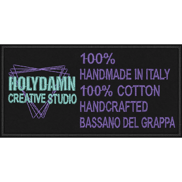 Patch ricamato su panno sombrod nero HOLYDAMN hand made cm. 8 x 4