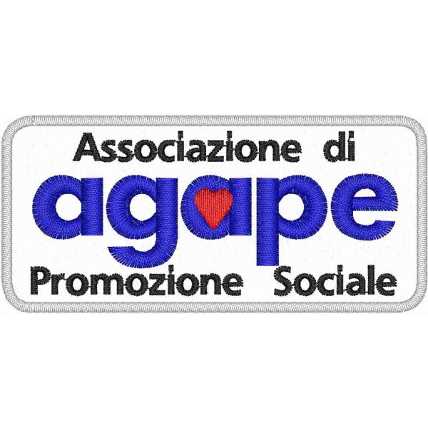 Patch ricamato associazione AGAPE su base bianca cm. 9 x 4