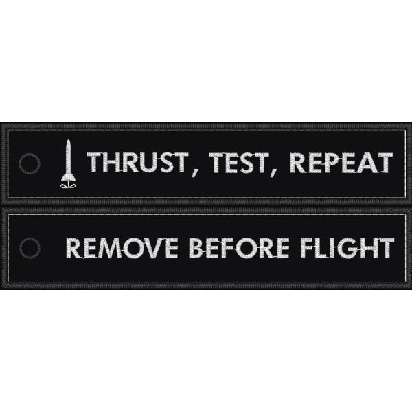 Patch ricamato "TRUST, TEST, REPEAT" lato primo