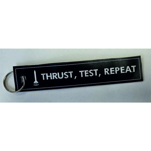 Patch ricamato "TRUST, TEST, REPEAT" lato primo